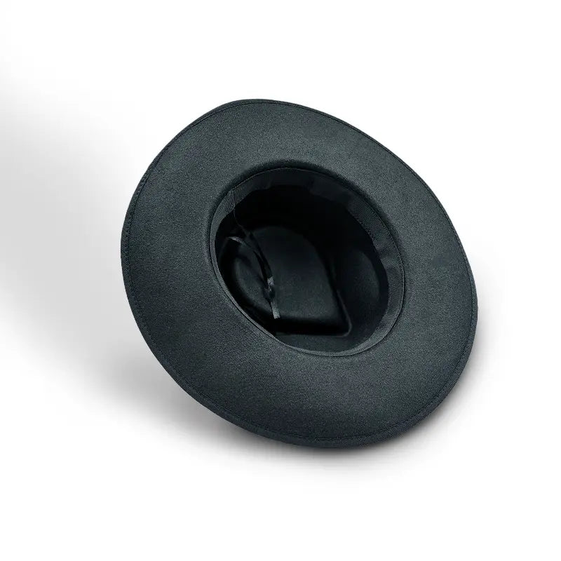 Black wide - brimmed hat with black inner lining and a thin black strap inside
