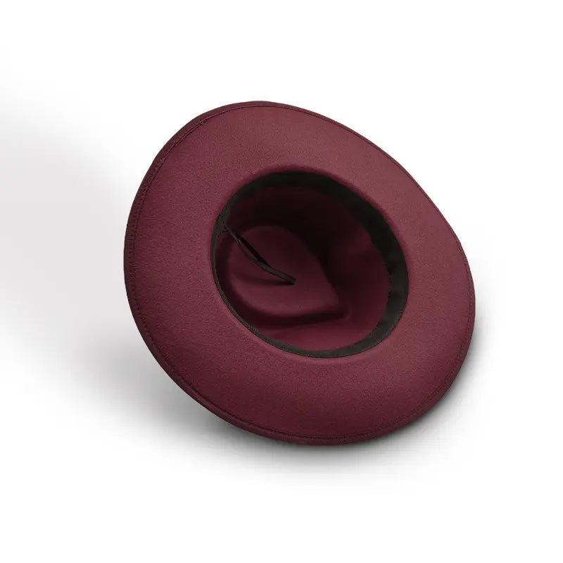 Wine wide - brimmed hat with dark inner lining and thin strap inside