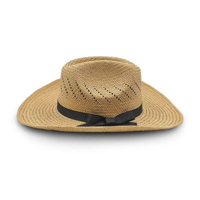 Light khaki straw cowboy hat with a black ribbon and bow, featuring perforations for ventilation.