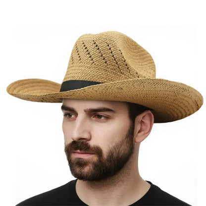 A man wearing a black shirt wears a light khaki straw cowboy hat with a black ribbon.