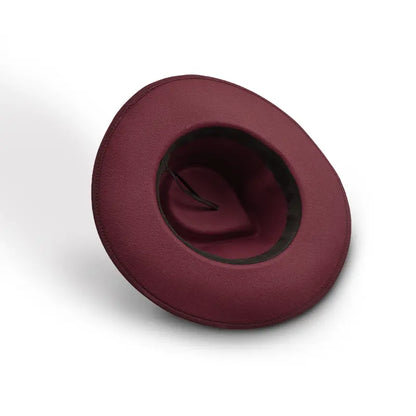 Wine wide - brimmed hat with dark inner lining and thin strap inside