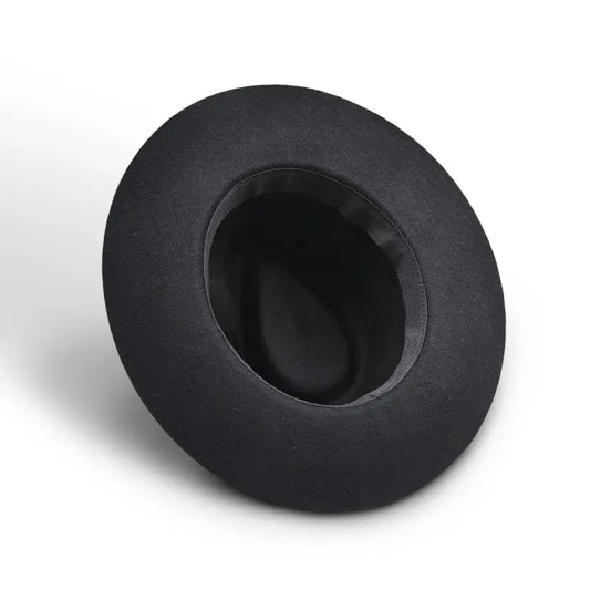 Black round - topped hat with inner lining
