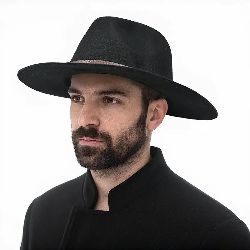 Man wearing black wide - brimmed hat with light - colored band, black high - neck coat