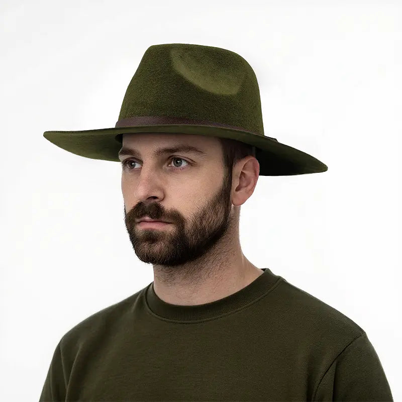 Man wearing olive green wide - brimmed hat with brown leather band, olive green crewneck shirt