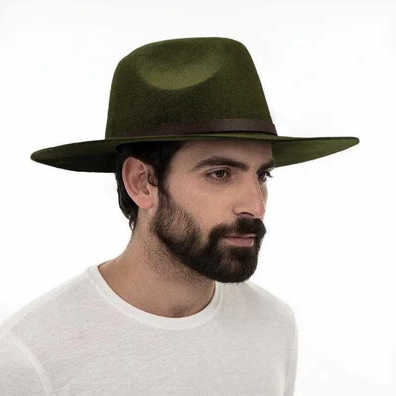 Man wearing olive green wide - brimmed hat with brown leather band, white crewneck shirt
