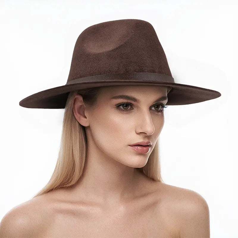 Woman wearing brown wide - brimmed hat with dark band