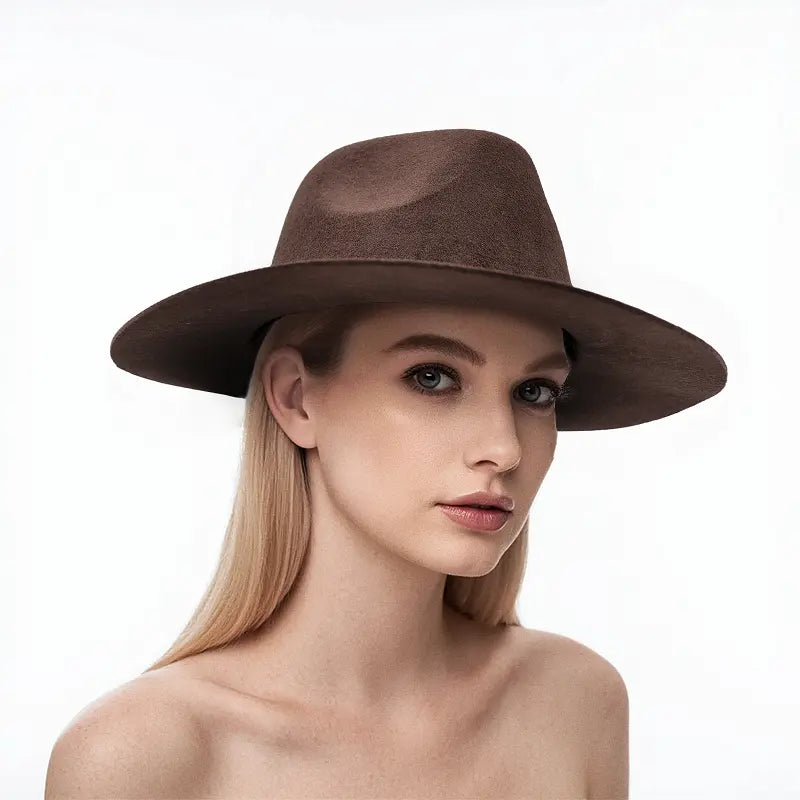 Woman wearing brown wide - brimmed hat with dark band
