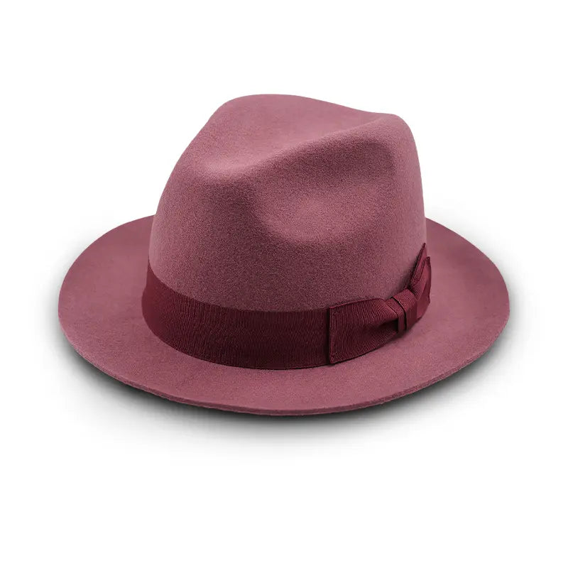 Dusty rose felt fedora - style hat with matching band and bow detail.
