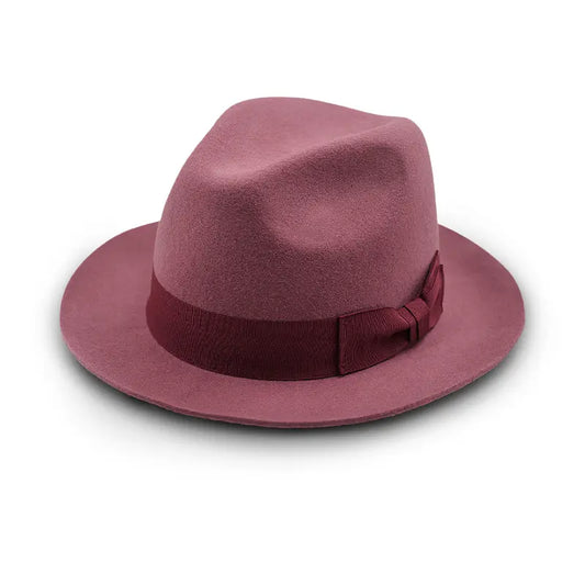 Dusty rose felt fedora - style hat with matching band and bow detail.