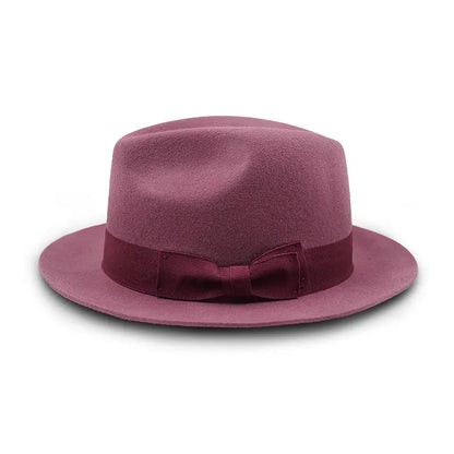 Dusty rose felt fedora - style hat with matching band and bow detail.