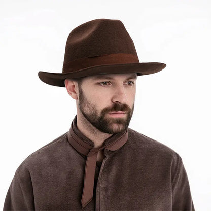The man in the brown turtleneck sweater wears a brown felt fedora hat with a brown hatband.