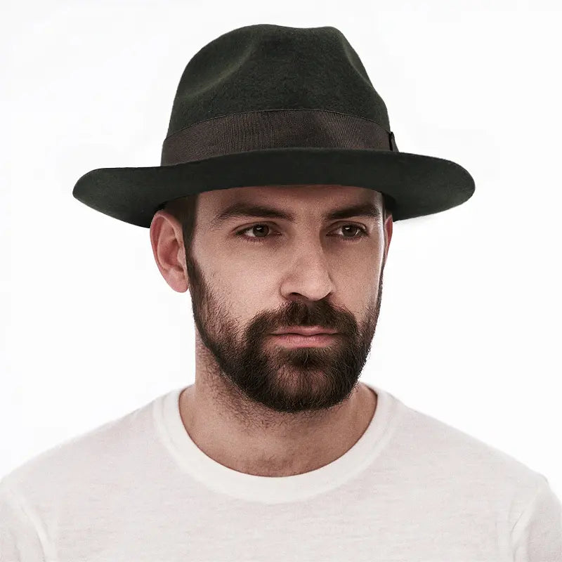 The man in the white shirt wore a dark green, wide-brimmed fedora hat with a dark grey band on the brim.