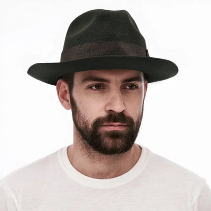 The man in the white shirt wore a dark green, wide-brimmed fedora hat with a dark grey band on the brim.